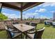 Enjoy the city skyline from the covered rooftop terrace featuring a dining area, lounge area, and outdoor turf at 629 Boulevard Ne, Atlanta, GA 30308