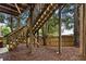 Backyard with wooden stairs, providing access to the upper levels of the house at 632 Plaza Se Dr # 6, Kennesaw, GA 30144