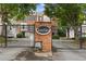 Community entrance gate featuring a secure entry to TownView homes and well-maintained landscaping at 632 Plaza Se Dr # 6, Kennesaw, GA 30144