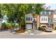 Charming brick townhome with a two car garage, complemented by a well-maintained lawn and mature trees at 632 Plaza Se Dr # 6, Kennesaw, GA 30144