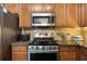 Close up of kitchen featuring stainless steel appliances and granite countertops at 632 Plaza Se Dr # 6, Kennesaw, GA 30144