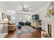 Bright and airy living room with hardwood floors and lots of natural light at 632 Plaza Se Dr # 6, Kennesaw, GA 30144