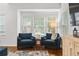 Cozy living room seating area with large window at 632 Plaza Se Dr # 6, Kennesaw, GA 30144