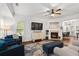 Spacious living room featuring a fireplace, hardwood floors and comfortable seating at 632 Plaza Se Dr # 6, Kennesaw, GA 30144