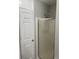Bathroom features a shower and linen closet behind a door at 7245 W Strickland St, Douglasville, GA 30134