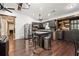 Stylish kitchen with granite countertops, stainless steel appliances, an island and hardwood floors at 1490 Ashbrook Dr, Lawrenceville, GA 30043