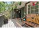 Inviting covered porch with comfortable seating, perfect for relaxing and enjoying the outdoors at 1490 Ashbrook Dr, Lawrenceville, GA 30043