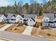 Aerial view of the community showcasing the layout and proximity to the forest at 2865 Ferncliff St, Cumming, GA 30028