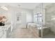 Spacious primary bathroom with a glass-enclosed shower and a soaking tub at 2865 Ferncliff St, Cumming, GA 30028