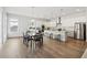 Elegant dining area features hardwood floors and is conveniently located next to the gourmet kitchen at 2865 Ferncliff St, Cumming, GA 30028