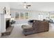 Bright and airy living room with fireplace, large windows, and comfortable seating at 2865 Ferncliff St, Cumming, GA 30028