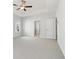 Spacious main bedroom with tray ceiling, lots of natural light and ensuite bathroom access at 2865 Ferncliff St, Cumming, GA 30028
