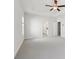 Large main bedroom with tray ceiling and ensuite bath access at 2865 Ferncliff St, Cumming, GA 30028