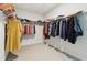 Spacious walk-in closet with ample storage and organization at 2865 Ferncliff St, Cumming, GA 30028