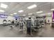 Brightly lit community gym featuring modern exercise equipment and TVs at 301 Downing Creek Trl, Canton, GA 30114
