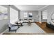 Bright living room featuring a modern design with hardwood floors and lots of light at 4000 Crossings Way, Stone Mountain, GA 30083