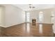 Spacious living room boasts a fireplace, large windows, and hardwood floors for an elegant touch at 4124 Berwick Farm Dr, Duluth, GA 30096