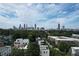 Scenic aerial view of Atlanta skyline, neighborhood streets, and modern rooftops at 647 East Ne Ave, Atlanta, GA 30312