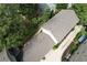Aerial perspective of a home with mature trees, showcasing the roof and surrounding landscape at 647 East Ne Ave, Atlanta, GA 30312