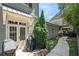 Backyard featuring an outdoor grill, walkway and patio. Exterior doors lead to inside at 647 East Ne Ave, Atlanta, GA 30312