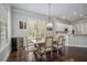 Elegant dining room with modern lighting and hardwood floors at 647 East Ne Ave, Atlanta, GA 30312