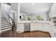 Modern kitchen with stainless steel appliances and marble countertops at 647 East Ne Ave, Atlanta, GA 30312
