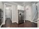 Spacious kitchen with stainless steel refrigerator and hardwood floors at 647 East Ne Ave, Atlanta, GA 30312