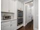 Kitchen with stainless appliances, double oven and white tile backsplash at 647 East Ne Ave, Atlanta, GA 30312