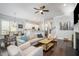 Bright and airy living room features open floor plan and hardwood floors at 647 East Ne Ave, Atlanta, GA 30312