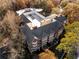 Aerial view of the building surrounded by colorful fall foliage at 1717 N Decatur Ne Rd # 214, Atlanta, GA 30307
