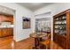 Dining area with hardwood floors, decorative hutch and an open view to the living room at 1717 N Decatur Ne Rd # 214, Atlanta, GA 30307