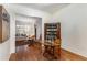 Dining area with hardwood floors, decorative hutch, and an open view to the living room at 1717 N Decatur Ne Rd # 214, Atlanta, GA 30307