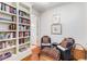 Cozy sitting area with a built-in bookshelf and decorative wicker seating, perfect for relaxing and reading at 1717 N Decatur Ne Rd # 214, Atlanta, GA 30307