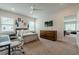 Spacious bedroom with dual windows, ceiling fan, TV, and desk space great for working from home at 2360 Charleston Manor Ln, Suwanee, GA 30024