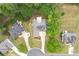 Beautiful shot of single-Gathering homes nestled among mature trees in a tranquil, well-maintained community at 3187 Gainer Dr, Powder Springs, GA 30127