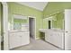 Well-lit bathroom boasts dual vanities and ample counter space at 3187 Gainer Dr, Powder Springs, GA 30127