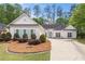 Charming single-story home with landscaped front yard and light blue shutters at 3187 Gainer Dr, Powder Springs, GA 30127