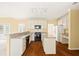 Spacious kitchen with granite countertops and an island and stainless steel appliances at 3187 Gainer Dr, Powder Springs, GA 30127
