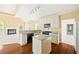 Bright kitchen with granite countertops and a kitchen island at 3187 Gainer Dr, Powder Springs, GA 30127
