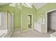Bright bathroom with a shower, soaking tub, double sink, and walk-in closet at 3187 Gainer Dr, Powder Springs, GA 30127