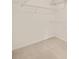 Empty walk-in closet featuring carpeted floors and metal shelving at 3187 Gainer Dr, Powder Springs, GA 30127