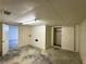 Unfinished basement with concrete floor, neutral painted walls, and lots of potential for upgrades at 3340 Zingara Rd, Conyers, GA 30012