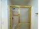 Bathroom featuring a shower with gold trim and a showerhead at 3340 Zingara Rd, Conyers, GA 30012