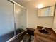 Bathroom featuring a shower, mirror, toilet, sink and modern fixtures at 3340 Zingara Rd, Conyers, GA 30012
