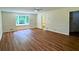 Bright bedroom with hardwood floors, large windows and an adjacent bathroom at 3340 Zingara Rd, Conyers, GA 30012