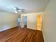This bedroom offers hardwood floors, a ceiling fan, closet, and bathroom access at 3340 Zingara Rd, Conyers, GA 30012
