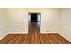 Dining space displaying hardwood floors and wainscoting, creating an elegant atmosphere for meals at 3340 Zingara Rd, Conyers, GA 30012