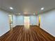 Spacious living room features hardwood floors and neutral walls, providing a blank canvas for personalization at 3340 Zingara Rd, Conyers, GA 30012