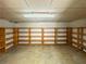 Spacious storage room with ample built-in wooden shelves, perfect for organization and storage at 3340 Zingara Rd, Conyers, GA 30012
