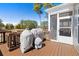 Back deck featuring grilling area with views of the surrounding landscape at 496 Spring View Dr, Woodstock, GA 30188